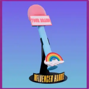A blue wireless microphone with a rainbow on it sitting on a black stand that has a plaque that read, "The Influencer Handle"